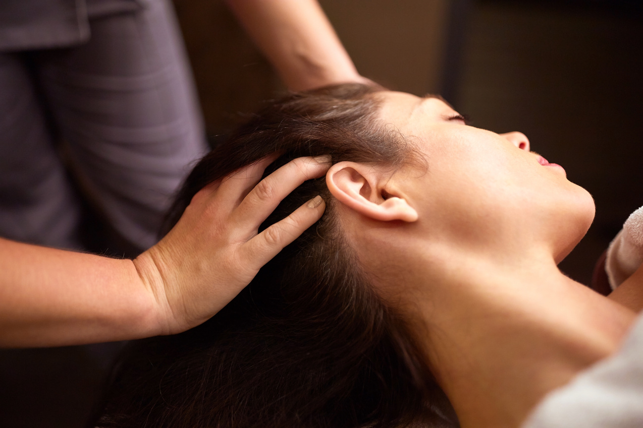 Woman Having Head Massage at Spa